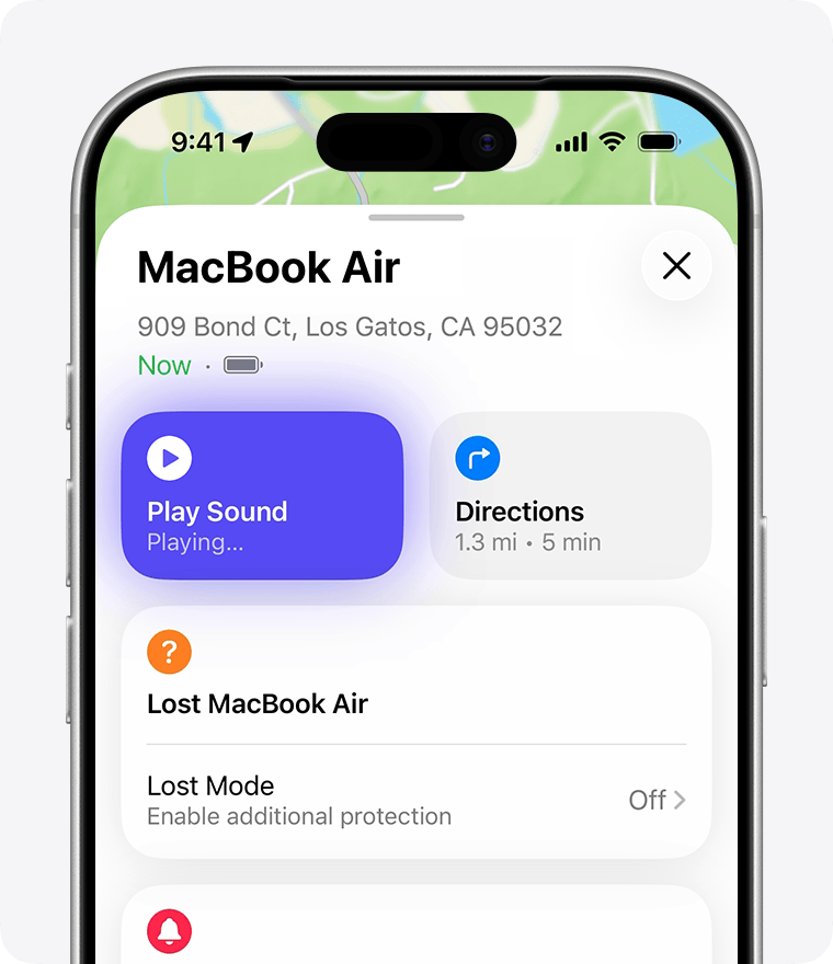 An iPhone with Find My open, showing the location of a MacBook Air. Play Sound is selected. The button is purple and says “Playing…”.