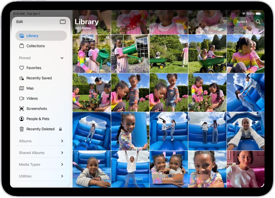 The Photos app is open and the Library tab is selected in the sidebar.